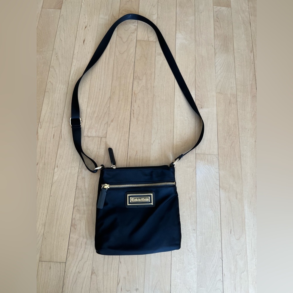 Calvin Klein black shoulder bag / purse w gold brand logo on front